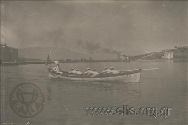 Commander I. Kallifronas on a boat, at the Poros Hellenic Naval Academy.