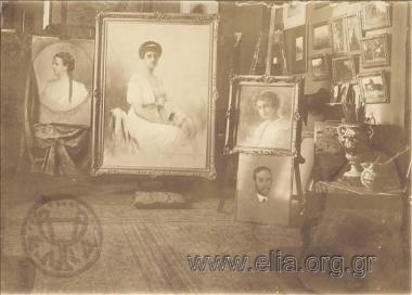 The studio of Viktor Dousmanis. The oil paintings portray (from left) Aikaterini Vourou, Maria Dousmani and Sofoklis Dousmanis.