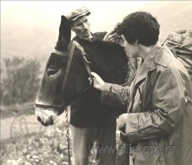 Gordon and Maria Draper on an excursion by mule from Distomo to Osios Lucas. Maria Draper and Nikos the driver
