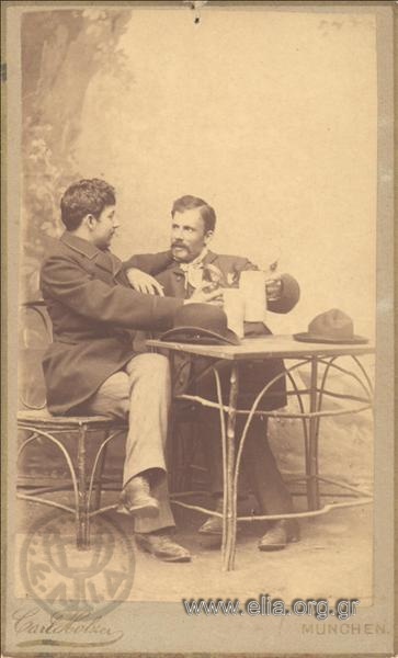 Alexandros Filadelfefs and D. Georgantas drinking beer