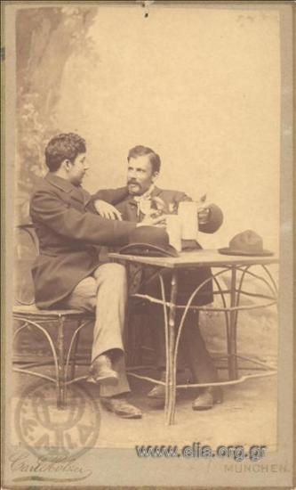 Alexandros Filadelfefs and D. Georgantas drinking beer