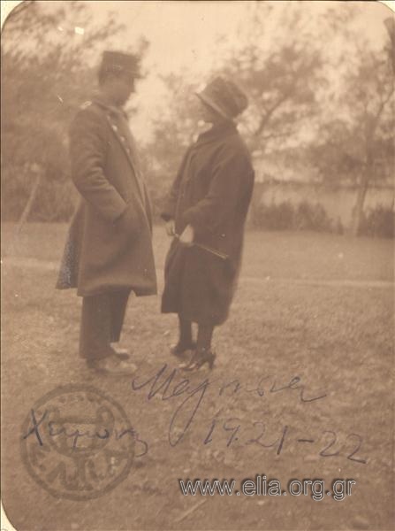 Lieutenant Dimitrios Georgakopoulos talking with a woman