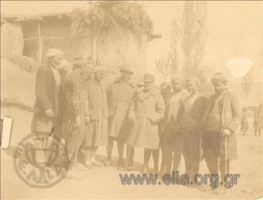 Asia Minor campaign:Greek  serviceman and Turkish paesants. .