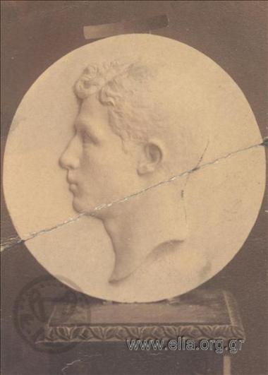 Medal bearing a male portrait in relief. Work by Kostas Dimitriadis.