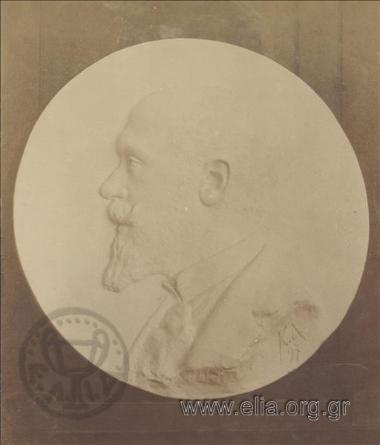 Medal bearing a male portrait in relief. Work by Kostas Dimitriadis.