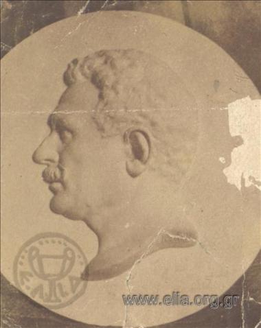 Medal bearing a male portrait in relief. Work by Kostas Dimitriadis.