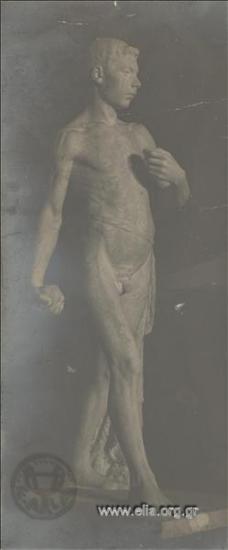 Statue of a young man by Kostas Dimitriadis