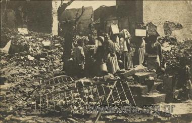 Salonica. After Fire Aug 18th 1917. Finding Water amidst ruins.
