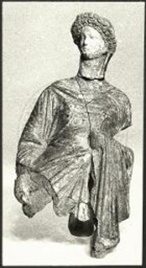 Μεσημβρία. Τμήμα ειδωλίου γυναίκας με ιμάτιο.