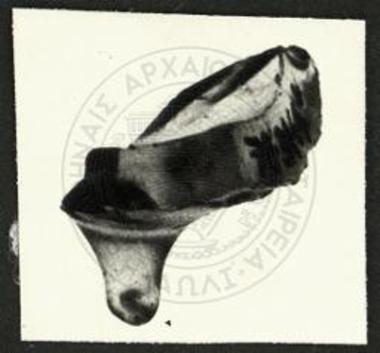 (EN) Object of glass. Undecorated fragment. Isthmus TR1 tr2 (5). Part of pointed base of unguentarium (78.3464).