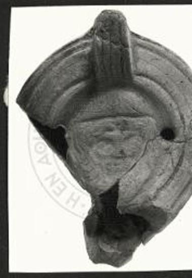 (EN) The Roman Lamps. Lower City TR1 S (3). Four frs., two of which join, preserving handle, most of disk, rim and base (78.1219).