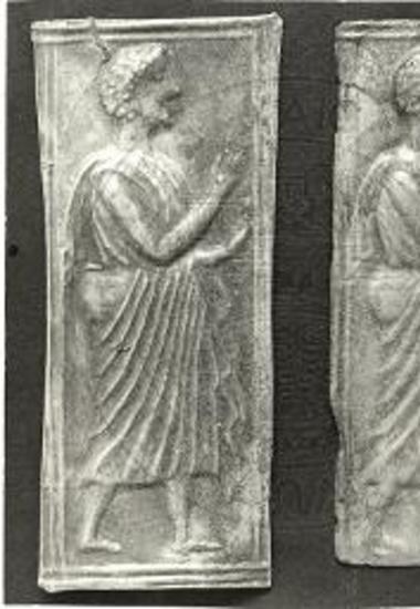 Αργυρούν και χαλκούν πλακίδιον με λατρευτάς.