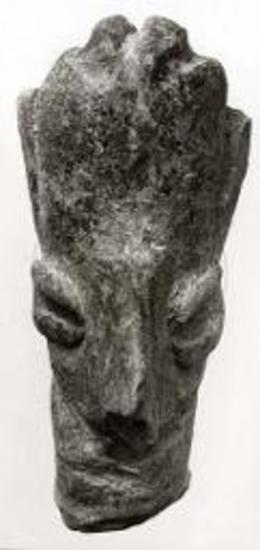 Terracotta head of a neolithic female figurine.