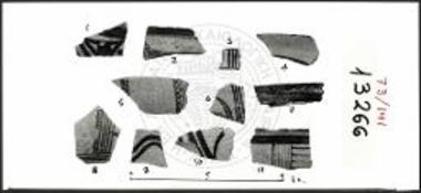 Νοτιοδυτική Συνοικία, Μεσαίος Δρομίσκος, περιοχή του κατωφλίου της καθόδου προς το τείχος.