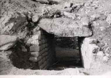 Μasonry and dromos of tholos tomb .