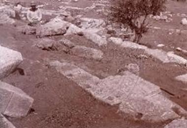 Line of stones with pegging holes (stylobate).