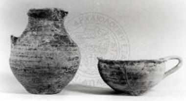 One handled cup and oenochoe.