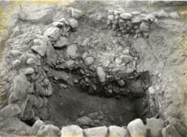 Deposit pit containing offerings for the dead.
