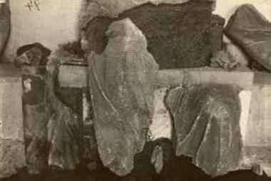 The right thigh and the left knee of the Demeter statue.