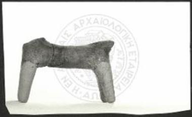 Small headless horse with slender body.