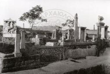 Peribolos tomb with grave markers.
