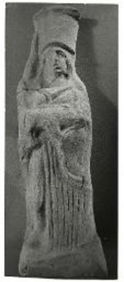 Πήλινον ειδώλιον γυναικός.