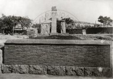 Peribolos tomb with grave stele.