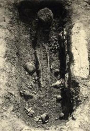 Pit grave with grave offerings.