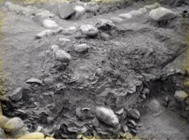 Deposit pit containing offerings for the dead.