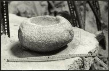 (EN) Cellar: a stone mortar.