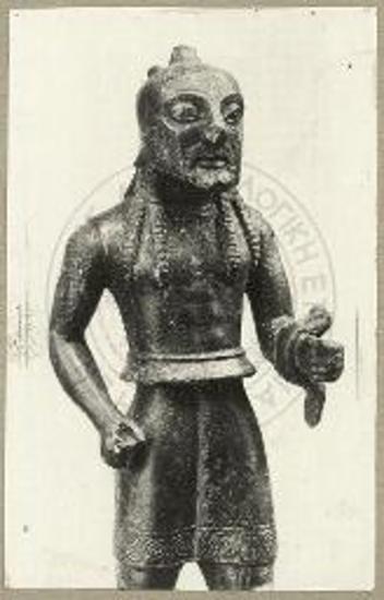 Χαλκούς οπλίτης. Όψις εκ των γονάτων και άνω.