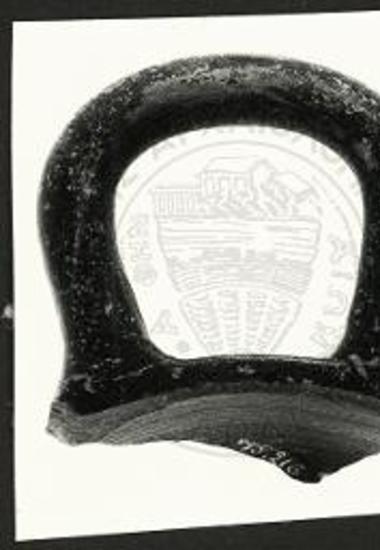 (EN) The Plain Black-Glazed Pottery. Structure 1 TR1 tr1 (8). Handle and rim fragment. (75.216). Chalkidic.