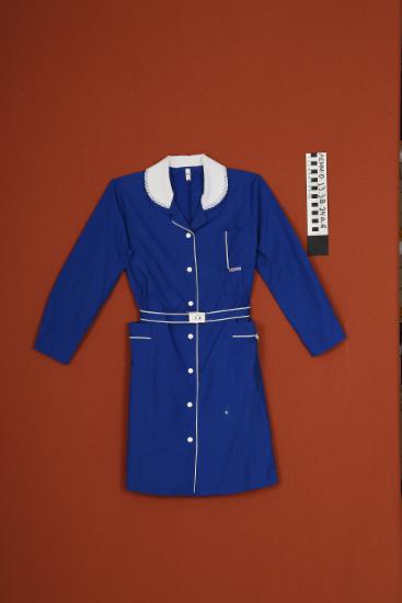 Ποδιά σχολική - ποδιά σχολική μαθήτριας βαμβακερή μπλε, με γιακά και επίρραπτο λευκό γιακά, σούρα στη μέση, τσέπες εκατέρωθεν και ζώνη