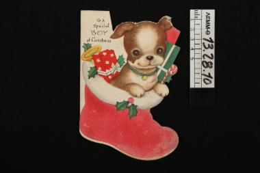Ευχητήρια κάρτα - κάρτα χριστουγεννιάτικη, σε σχήμα μπότας με ένα σκυλάκι και δώρα
