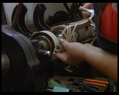 A shoe-maker machine working
