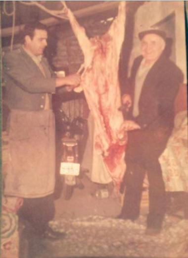 Preparing a pig for Christmas Eve in Kalochori, Thessaloniki, 20th century