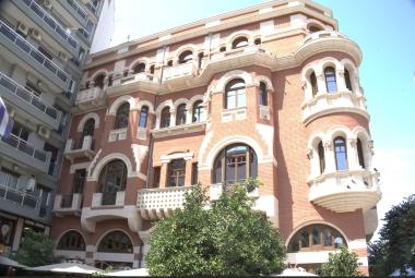 Detail of the red masonry of the Longos Mansion in Agias Sophias Square