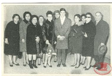 Maria Triantafyllidou with her husband on the day of the political wedding with relatives