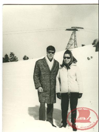 Maria Triantafyllidou with her husband, on a winter excursion in the snow