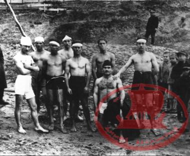 Theophany. Aretsou Waterfront. A commemorative photograph of the young men who retrieved the Cross of the Church of Saint Nicholas from the sea