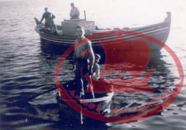 The fishing boat ''Poseidon'' of the Tsaousis Brothers and the small boat in Kallikrateia