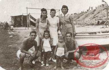 A group on the beach of Aretsou, below the park with the little pines