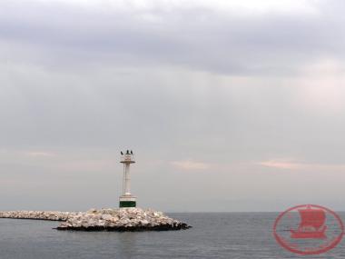 The lighthouse of the Aretsou Marina harbor