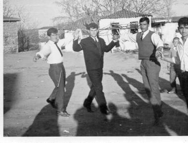 Nikitas Karavasileiadis dancing with his fellow villagers in 1963 in Askos, Volvi