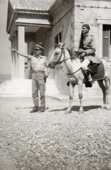 Nikitas Karavasileiadis on horseback in Evzone attire