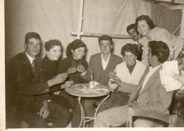 Nikitas Karavasileiadis with friends at a café in Askos, Volvi