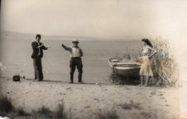 Residents enjoy themselves while listening to the radio at Lake Volvi
