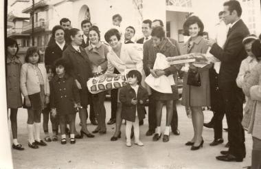 Scene from a baptism in Askos Volvi