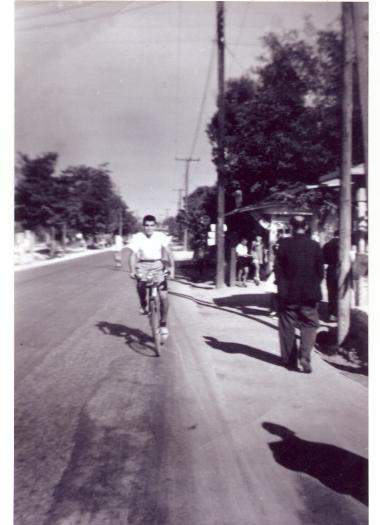 Yiannis Tavropoulos cycling up the then Vas. Olga in front of Paris' stand
