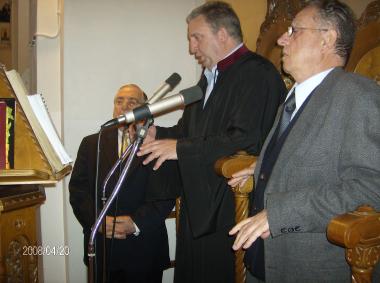 Palm Sunday 2008, at the Holy Church of Agios Panteleimon in Votsi, left cantor Athanasios Tsinatos.